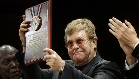 Elton John Receives Prestigious Humanitarian Award at Harvard University