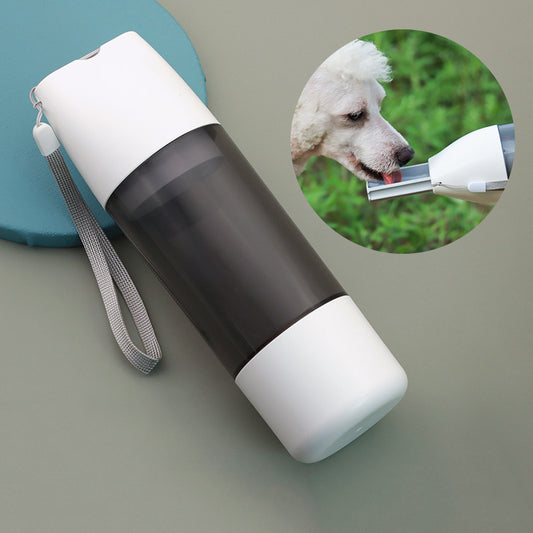 Portable Dog Water & Food Bottle in use.