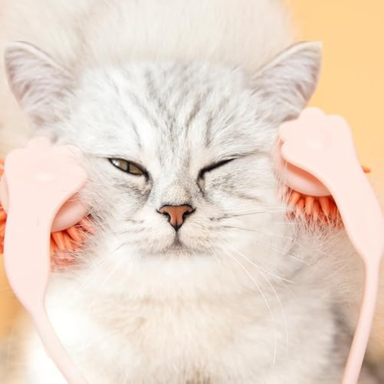 Close-up of Pink Cat Massager Roller in use.